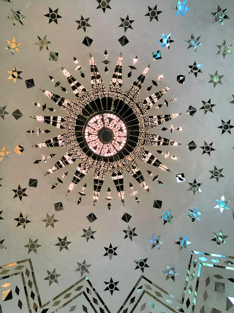 Shangri La Oahu Ceiling detail in the marble bathroom.