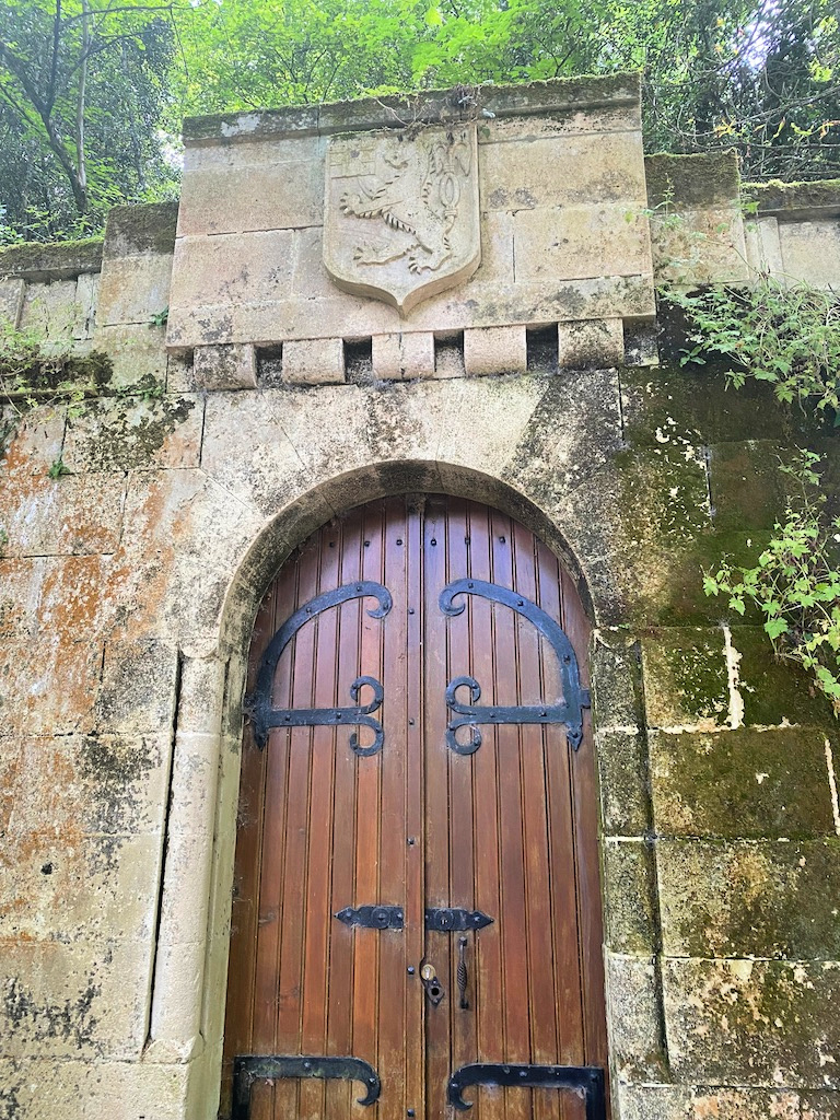 Door to the caves at Chateau de la Rivière