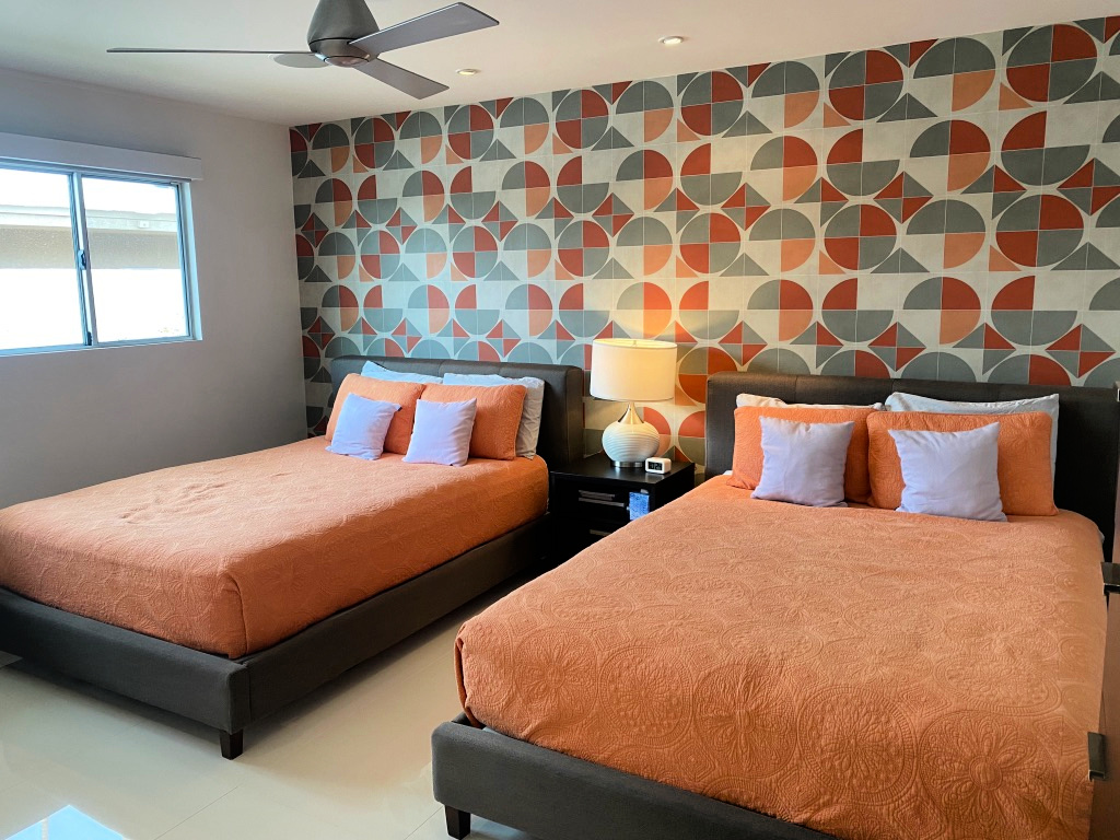 Hi-Sun bedrooms featuring bright colors, geometric patterns gscinparis