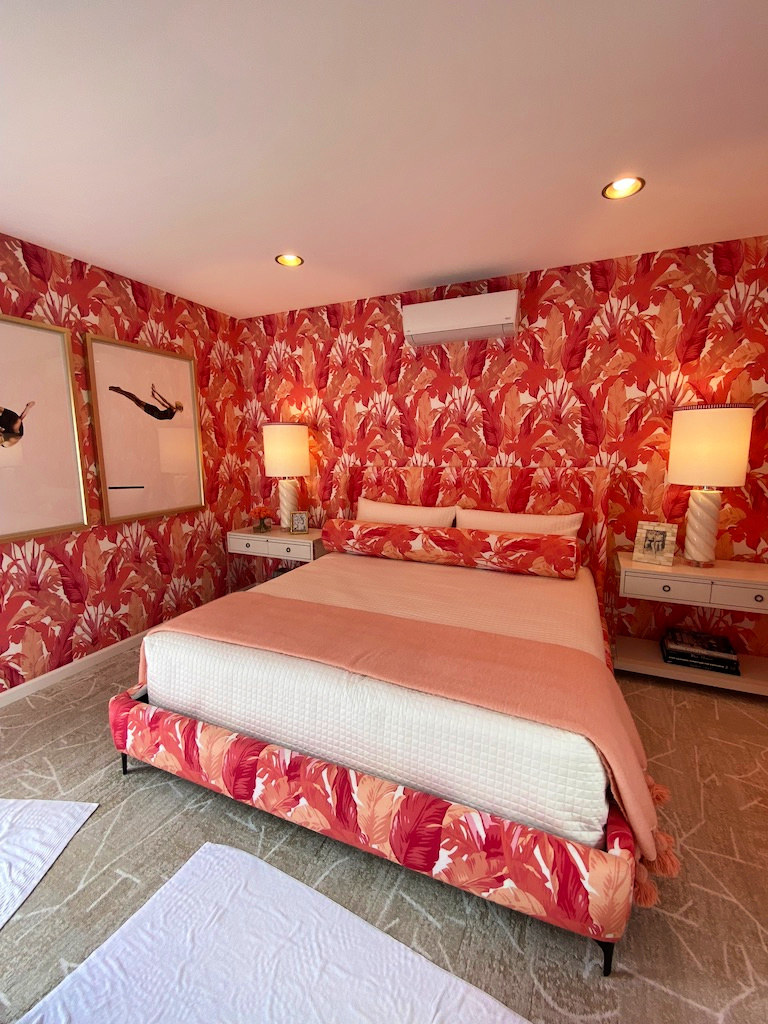 Colorful wallpaper and matching fabrics adorn the guest casita gscinparis