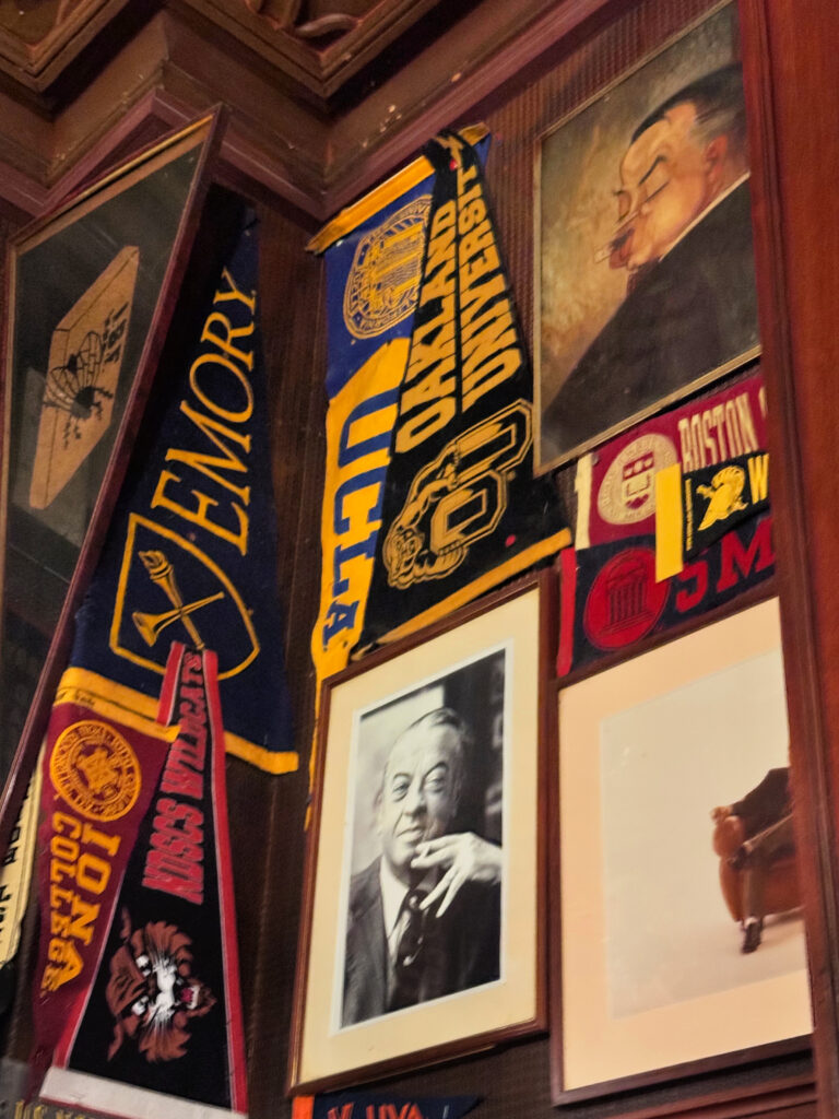 College spirit adorns the walls at Harry's Bar in Paris