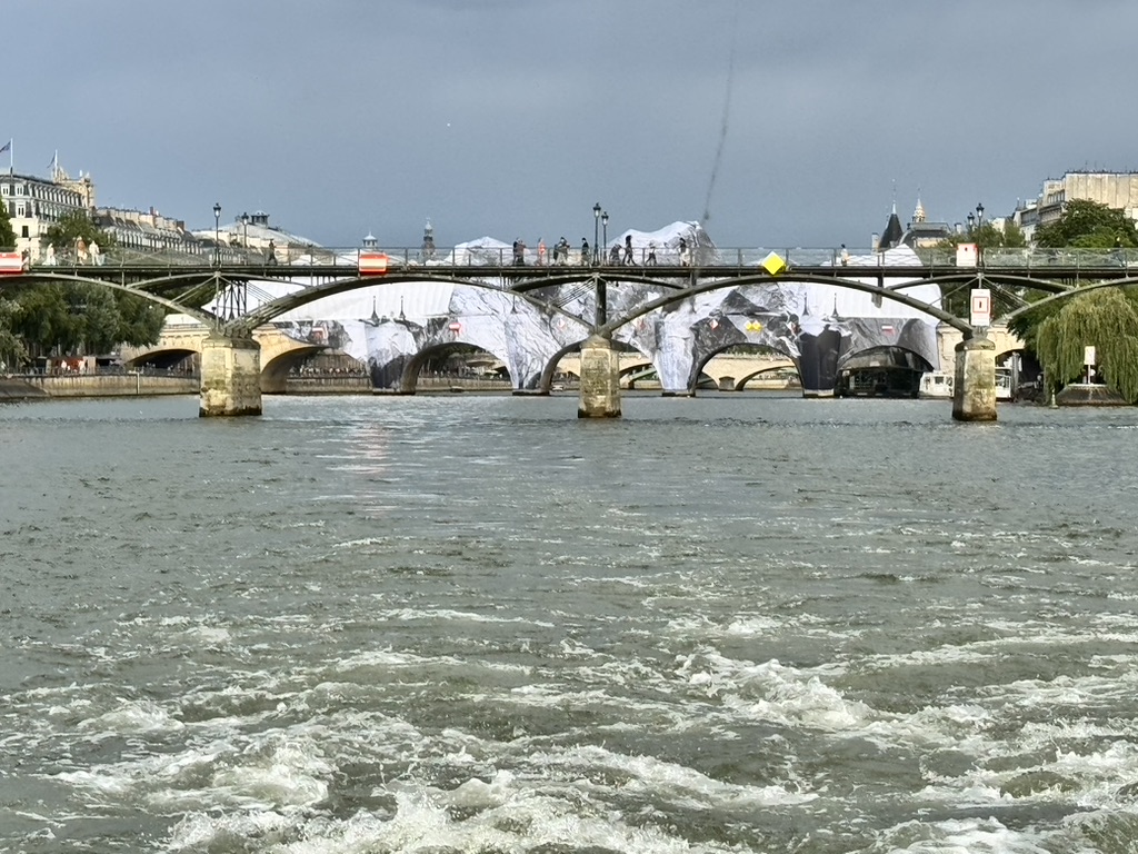 La Caverne du Pont Neuf by JR, viewed from a boat on the Seine